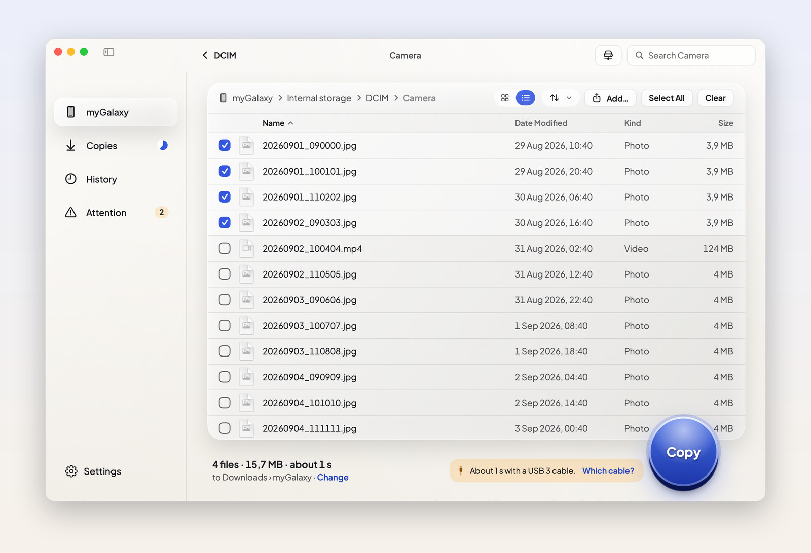 Browsing the phone's DCIM Camera folder as a list, with photos selected to copy