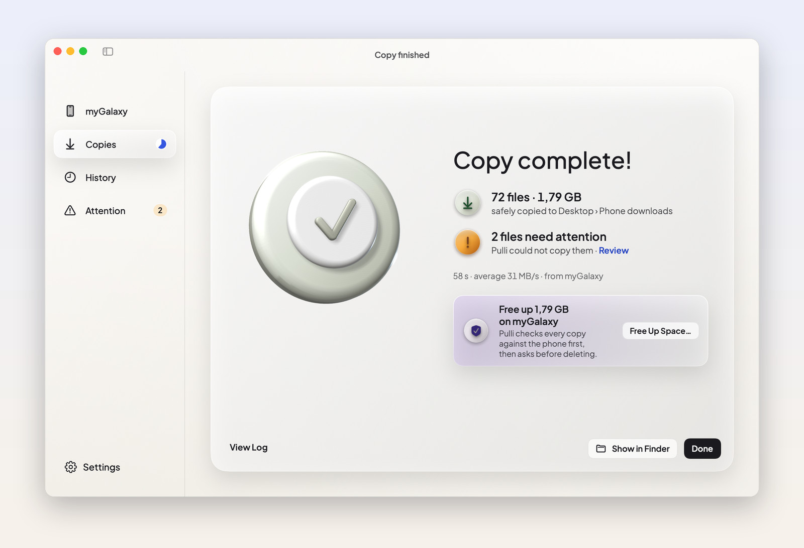 Copy complete: 72 files copied, 2 needing attention, with an offer to free up 1.79 GB on the phone